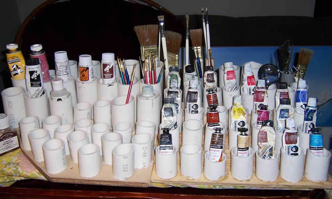 Paint brush holder and paints organiser