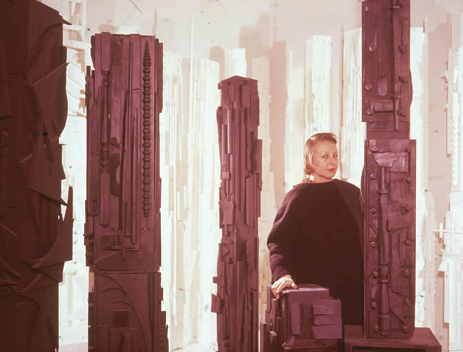 Louise Nevelson with her work in the 1950s