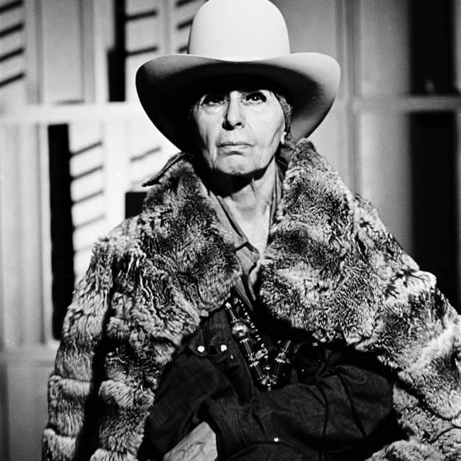 Louise Nevelson in the eccentric costume she was known for, photographed in her New York studio in 1974.