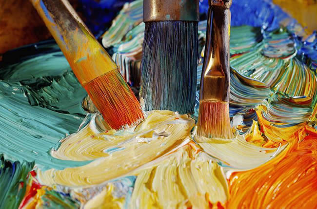 Paintbrushes Mixing Paint on a Palette
