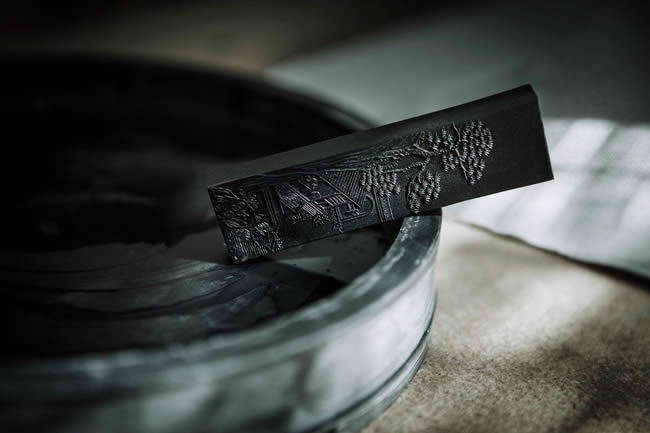 Close-Up Of Calligraphy Ink Stone On Table