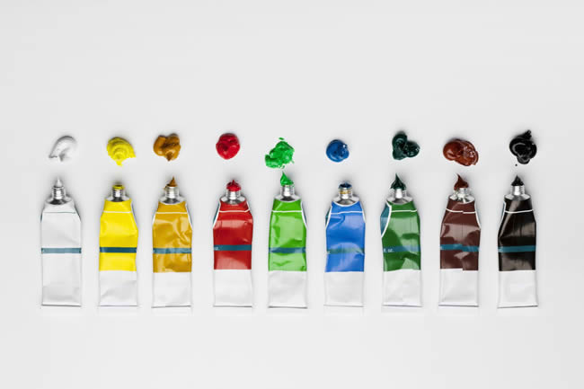 Opened tubes of paint.