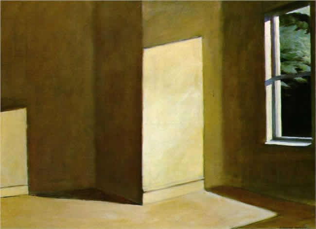 Sun shines through a window onto yellow walls