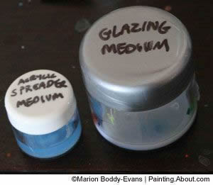 Small airtight containers for leftover paint or mediums.