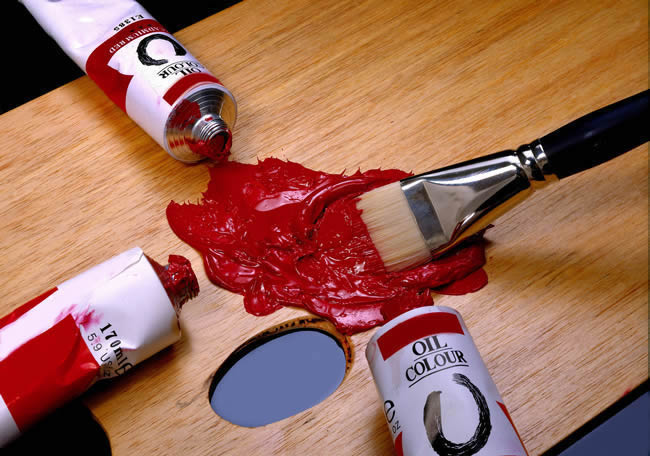 Brush with red oil color