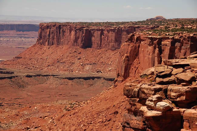 Grand Canyon under a bright, sunny sky.