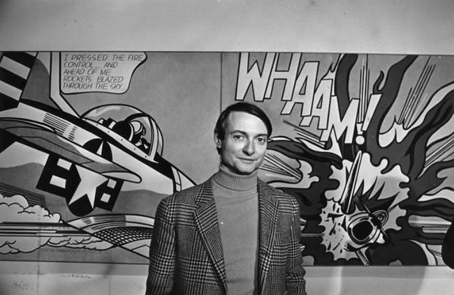 Roy Lichtenstein pictured in front of his painting, Whaam!