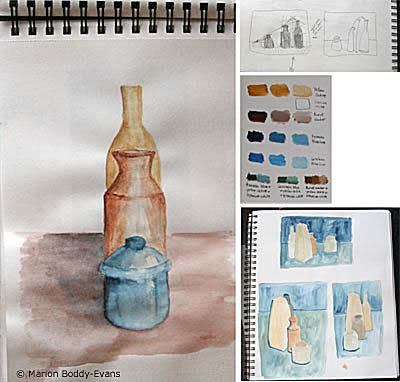 Artist sketchbook showing different painting ideas.