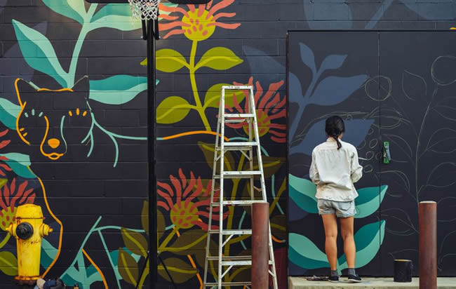 Mural artist at work