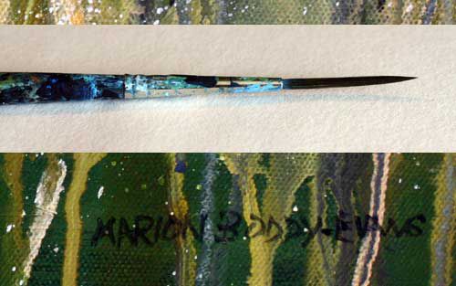 How to sign a painting with a brush.